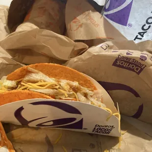 Dortios loco taco and Double Decker Taco beef burrito and soda drink