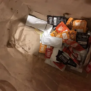 Sack soaked in oily grease, condiments stained with garbage piled into the sack
