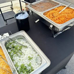 Setting up the sides and toppings! The Onion/Cilantro combo was to die for and so fresh!!