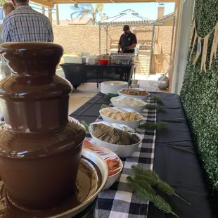 Chocolate Fountain dessert set up and taco man in my backyard by the pool!