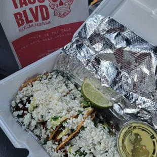 a meal in a styrofoam container