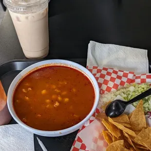 a bowl of soup and tortilla