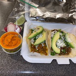 Pastor and asada tacos- add cheese and avocado.