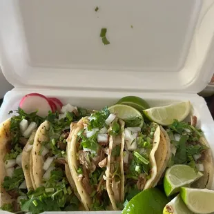 tacos in a styrofoam container
