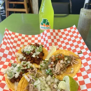 Two carnitas and two chorizo tacos.