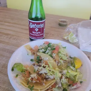 My fish tacos . More like tortillas with lettuce and pico de gallo and a $5 sangria I paid 14 bucks was ripped off didn&apos;t even finish them