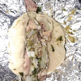 Taco de lengua straight trash tortillas from the micrawave