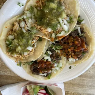 2 chicken tacos and 2 Asada tacos , I usually take the other tortilla out and make another taco for in this case I had 8 lol