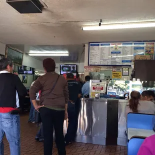 a group of people in a restaurant