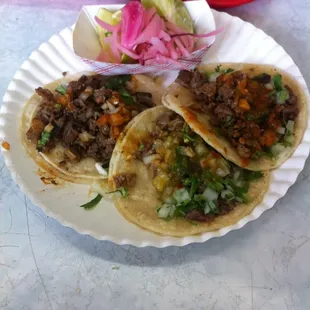 2 carne asada tacos and 1 lengua taco.