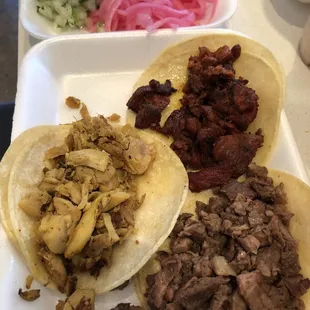 Pollo, pastor, and asada tacos