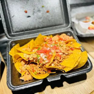 Nachos with chicken.  The cheese was on the side and not pictured here.