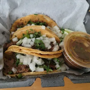 3 birria tacos with consomme