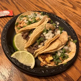 Far left to right: pollo, carne asada, Al pastor