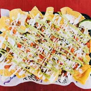 Loaded Nachos, or as we like to call them..Papos