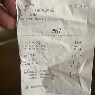 a person holding a receipt