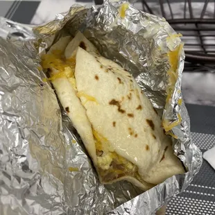 a burrito wrapped in foil