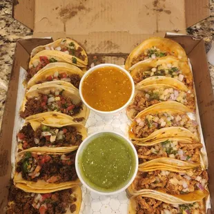 Family taco pack - 7 beef tacos, 7 chicken tacos, spicy salsa and salsa verde