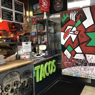 Wall artwork near the order counter.