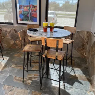 a table and chairs in a restaurant