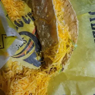 Crispy taco. Massive amt of chz. Too much, IMO. Ok taco. Prefer soft taco.