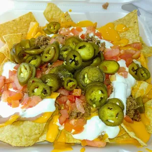 Super Nachos with hardly any meat.