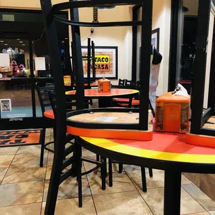 tables and chairs in a restaurant