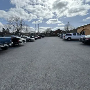 Beautiful clouds in the nearly filled Taco Casita parking lot.