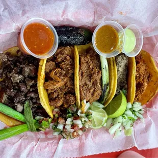 all 5 tacos: carne asada, al pastor, birria, cabeza, chicken tinga