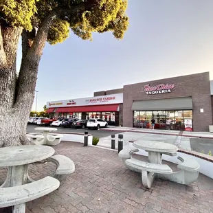 Nice outdoor seating area for the center, shaded by dinner time