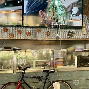 a bicycle parked in front of a counter