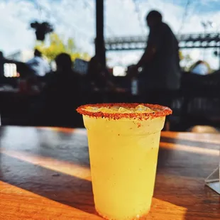 a taco in a plastic cup