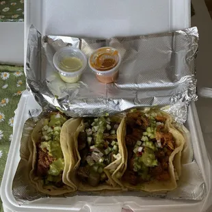 Tacos: Al Pastor, Lengua, Mixto (no onions) Spicy and crema sauce. Super yummy