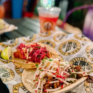 two tacos on a table