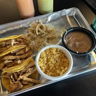 Monday is dollar taco day! I got 4 chicken with rice and beans and a drink. Just $11. Delicious. And affordable.