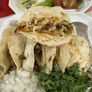 Tacos on Flour Tortillas  Pollo, carnitas, and barbacoa