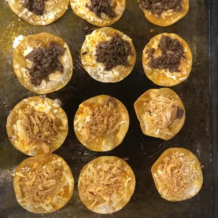 a tray of mini taco shells