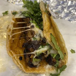 Al pastor taco, these are good if you like Mexican food.