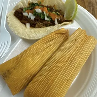 Taco de Barbacoa and pork tamales.