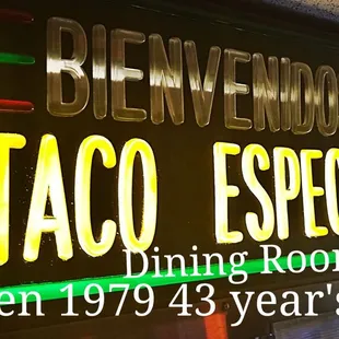 a neon sign in a restaurant