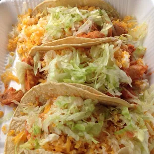 Chicken tacos on soft corn tortilla shells