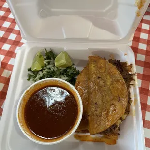 Birria tacos with consume