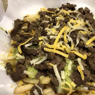 a closeup of a taco and cheese dish
