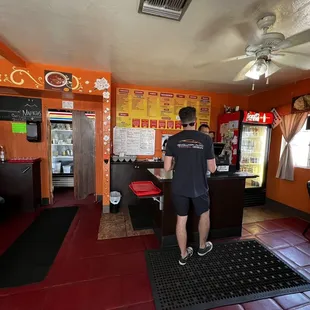 a man standing at the counter