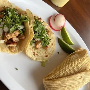 2 chicken tacos and a chicken tamale