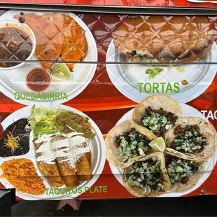 a food truck with tacos, quesadilla, quesadilla, and quesadilla