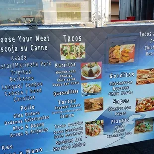 a menu on the side of a truck