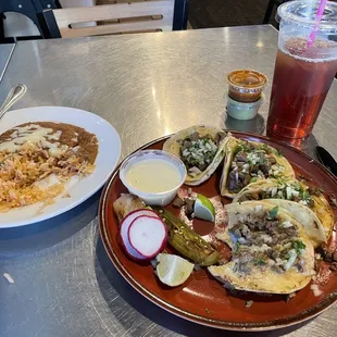 Combo 1 with all steak tacos, rice, and refried beans