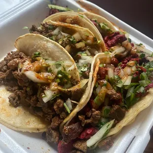 Asada tacos and Al pastor tacos