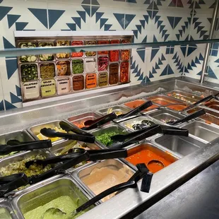 a variety of salads and condiments